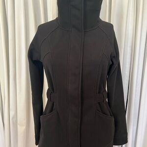 The North Face women’s Black high collar zip  Jacket